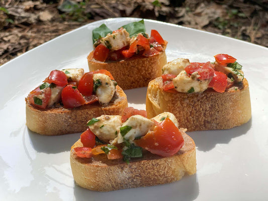 Tomato Mozzarella (Caprese) Bruschetta with White Truffle Sauce