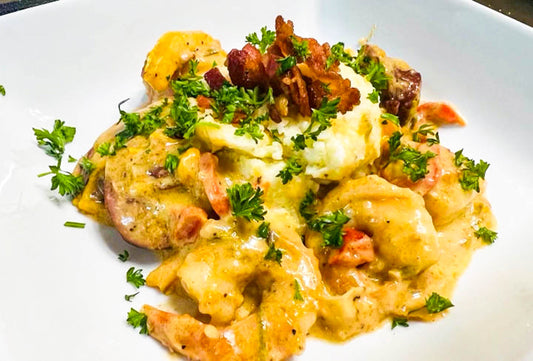 Truffle Shrimp and Grits with Bacon, made with Truffletopia White Truffle Sauce